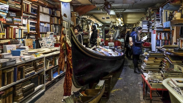 Libreria Acqua Alta bookstore interior in Venice
